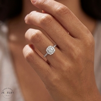 This is a 1.50 Carat Total Round Natural Diamond Halo Engagement Ring