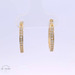 14k White Cz Oval Huggies Earrings