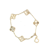 Ladies 14K yellow gold cable link bracelet with Diamond Cut Clover Charms.