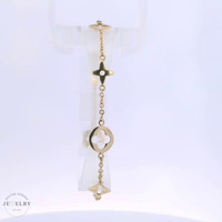 Ladies 14K Yellow Gold Stare & Clover Rolo Link Bracelet.