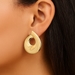  14k Sculptural Curling Circle Post Earrings